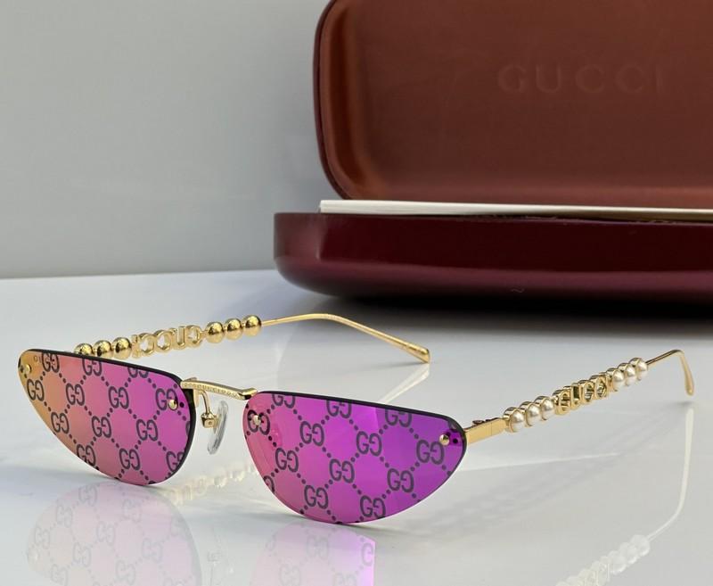 Gucci Oval Sunglasses with Pearl and Chain Detail
