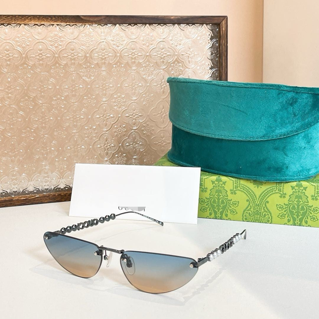 Gucci Oval Sunglasses with Pearl and Chain Detail