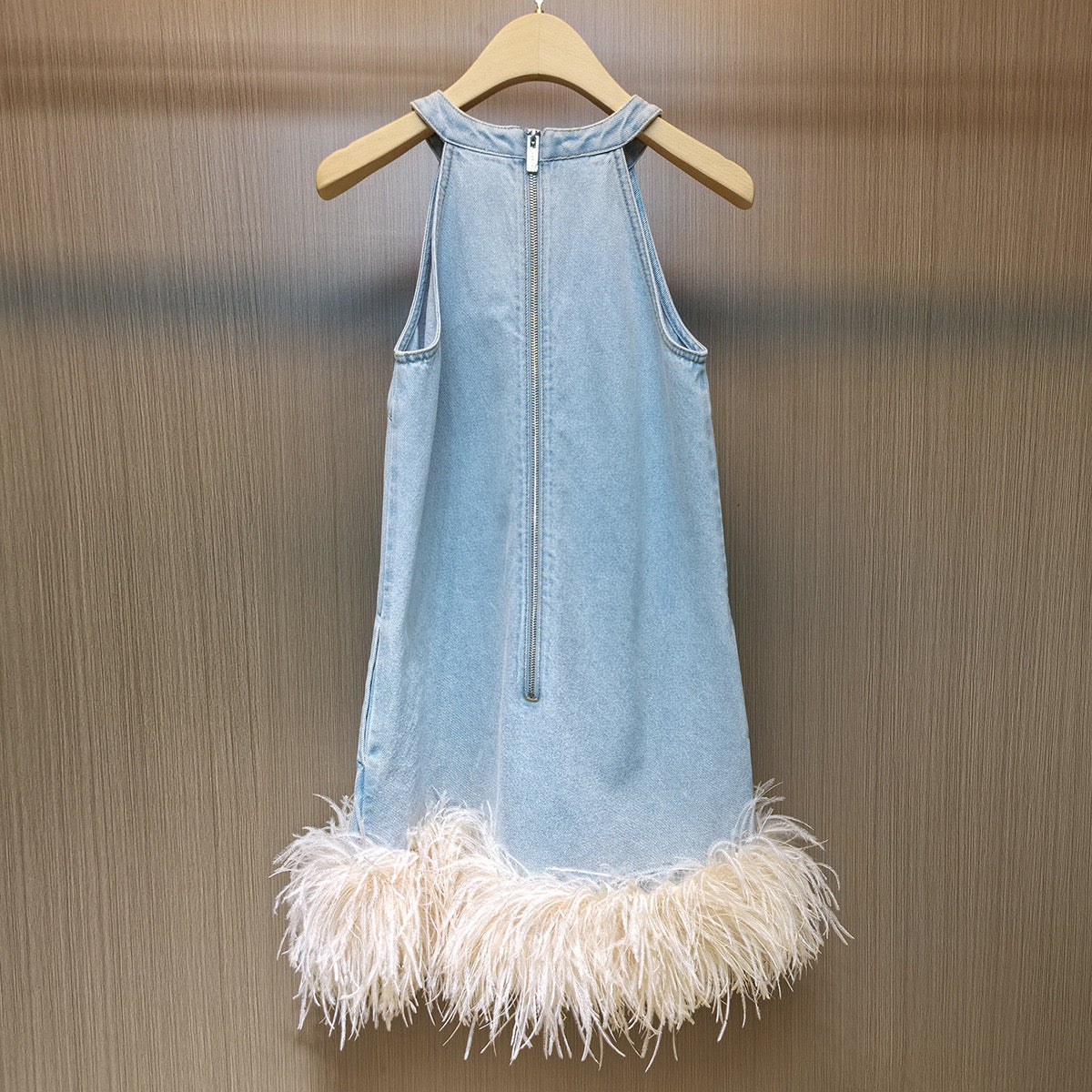 Chic Denim Mini Dress with Feather Hem