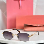 Miu Miu Geometric Sunglasses