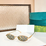 Gucci Embellished Oval Sunglasses