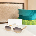 Gucci Oval Sunglasses with Pearl