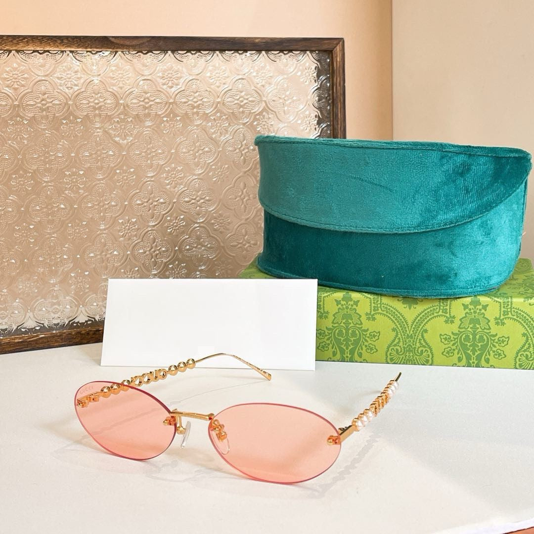 Gucci Oval Sunglasses with Pearl