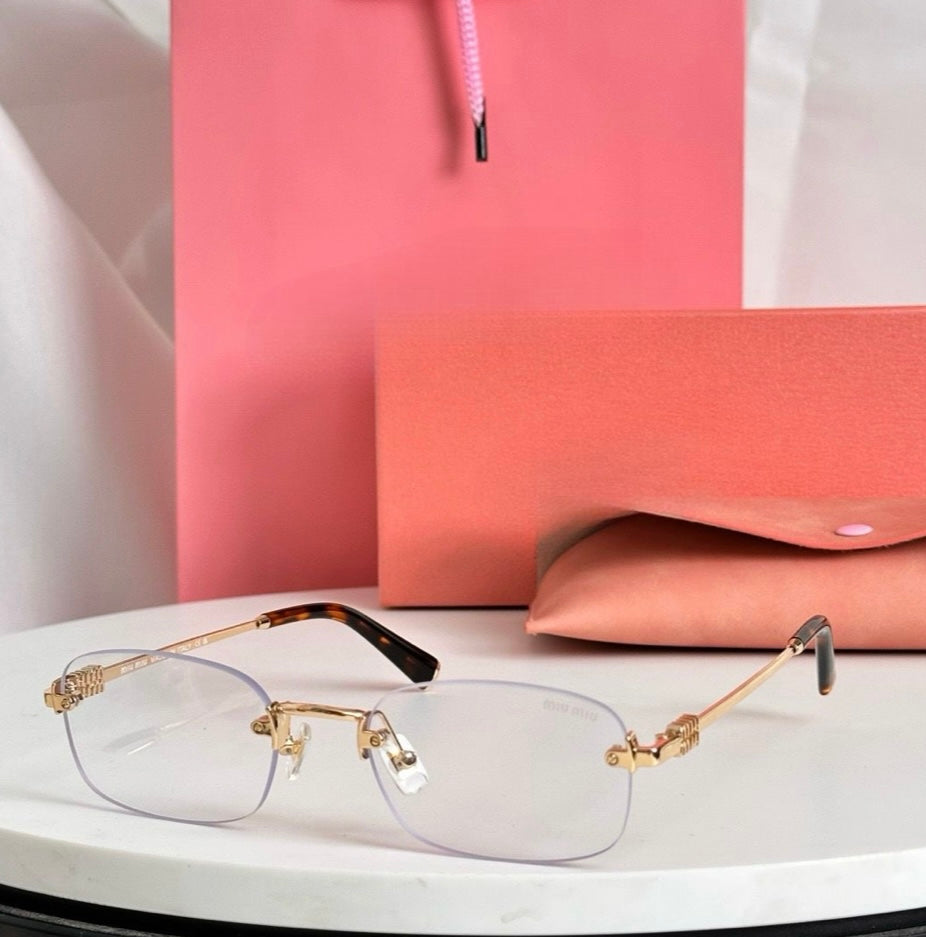 Miu Miu Geometric Sunglasses