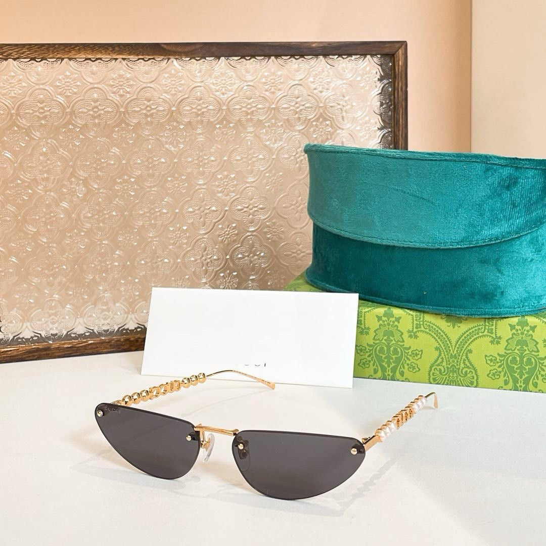 Gucci Oval Sunglasses with Pearl and Chain Detail