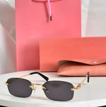 Miu Miu Geometric Sunglasses