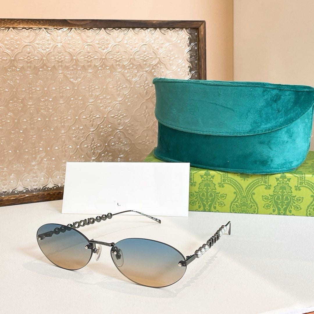 Gucci Oval Sunglasses with Pearl