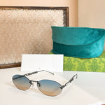 Gucci Oval Sunglasses with Pearl