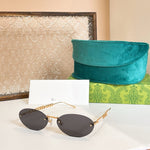 Gucci Oval Sunglasses with Pearl