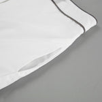 Crisp White Shirt and Belted Shorts Set