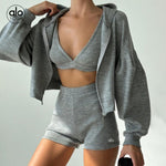 Alo Yoga Serenity Bra, High-Waist Biker Short, and Zip Hoodie Set