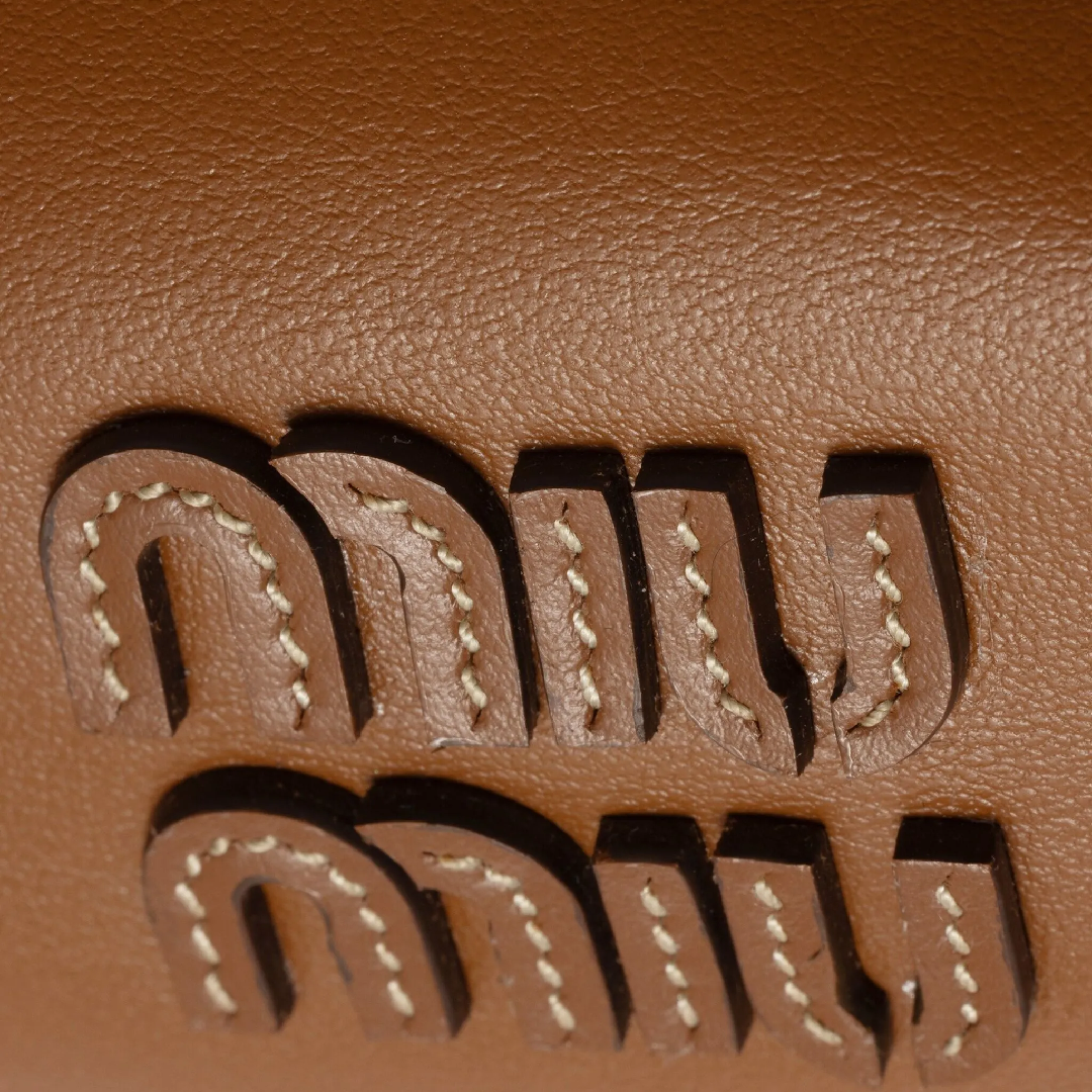 Miu Miu Matelasse Leather Backpack