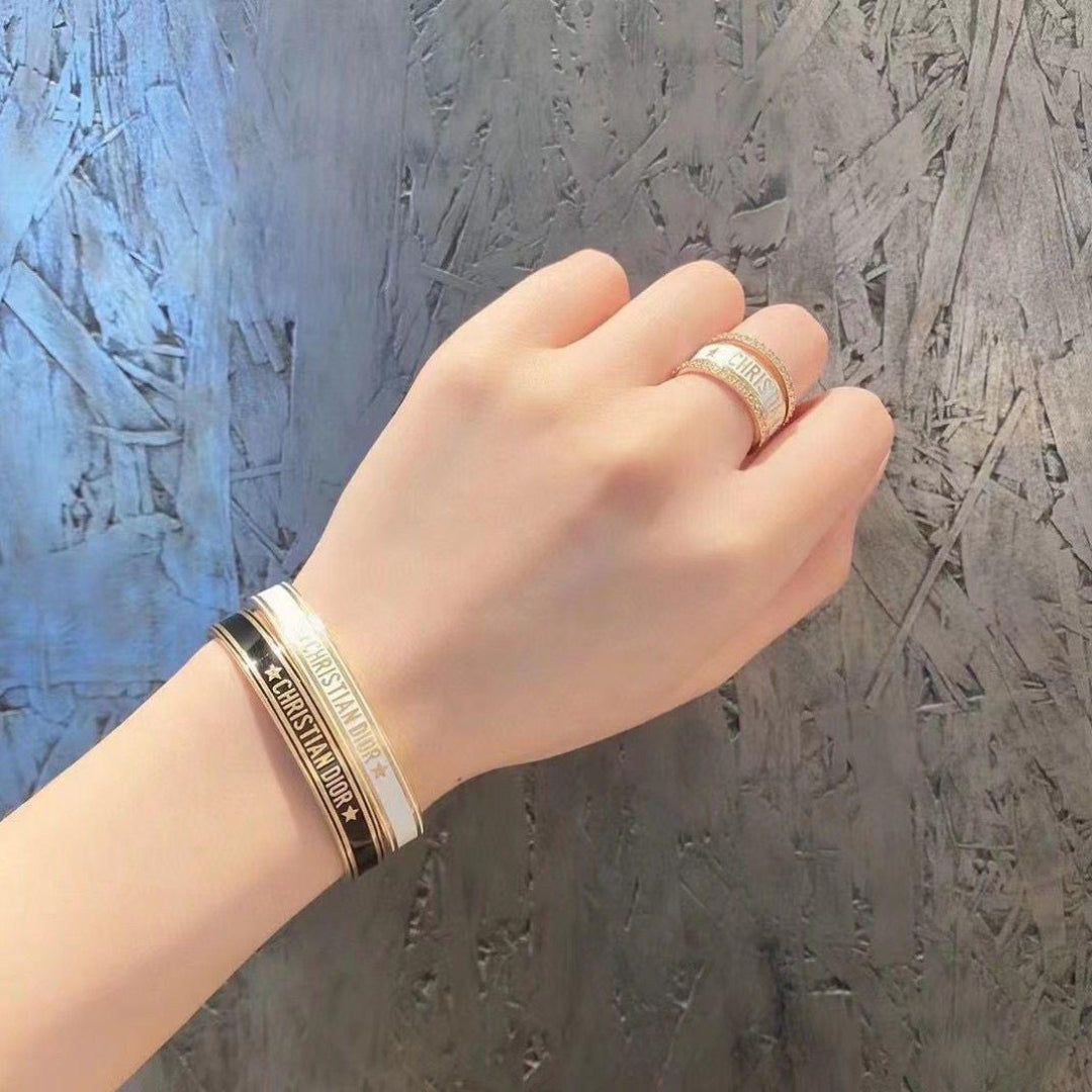 Christian Dior Open Cuff Bangles in Black and White
