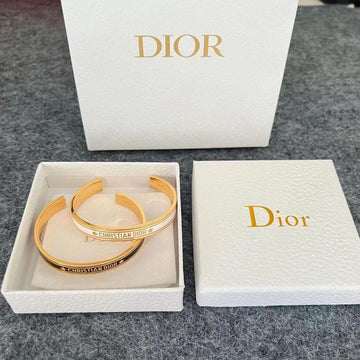 Christian Dior Open Cuff Bangles in Black and White