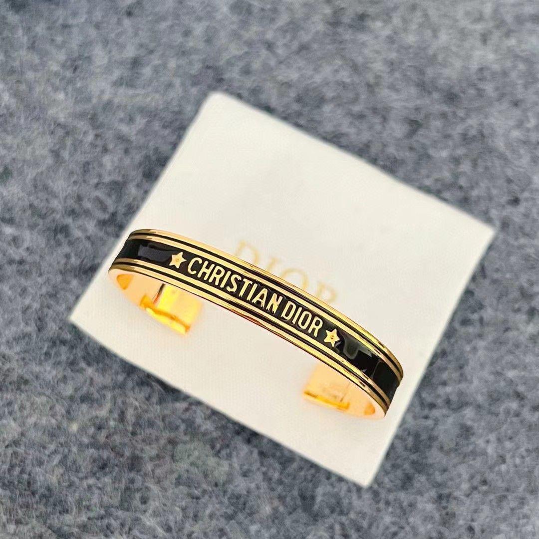 Christian Dior Open Cuff Bangles in Black and White