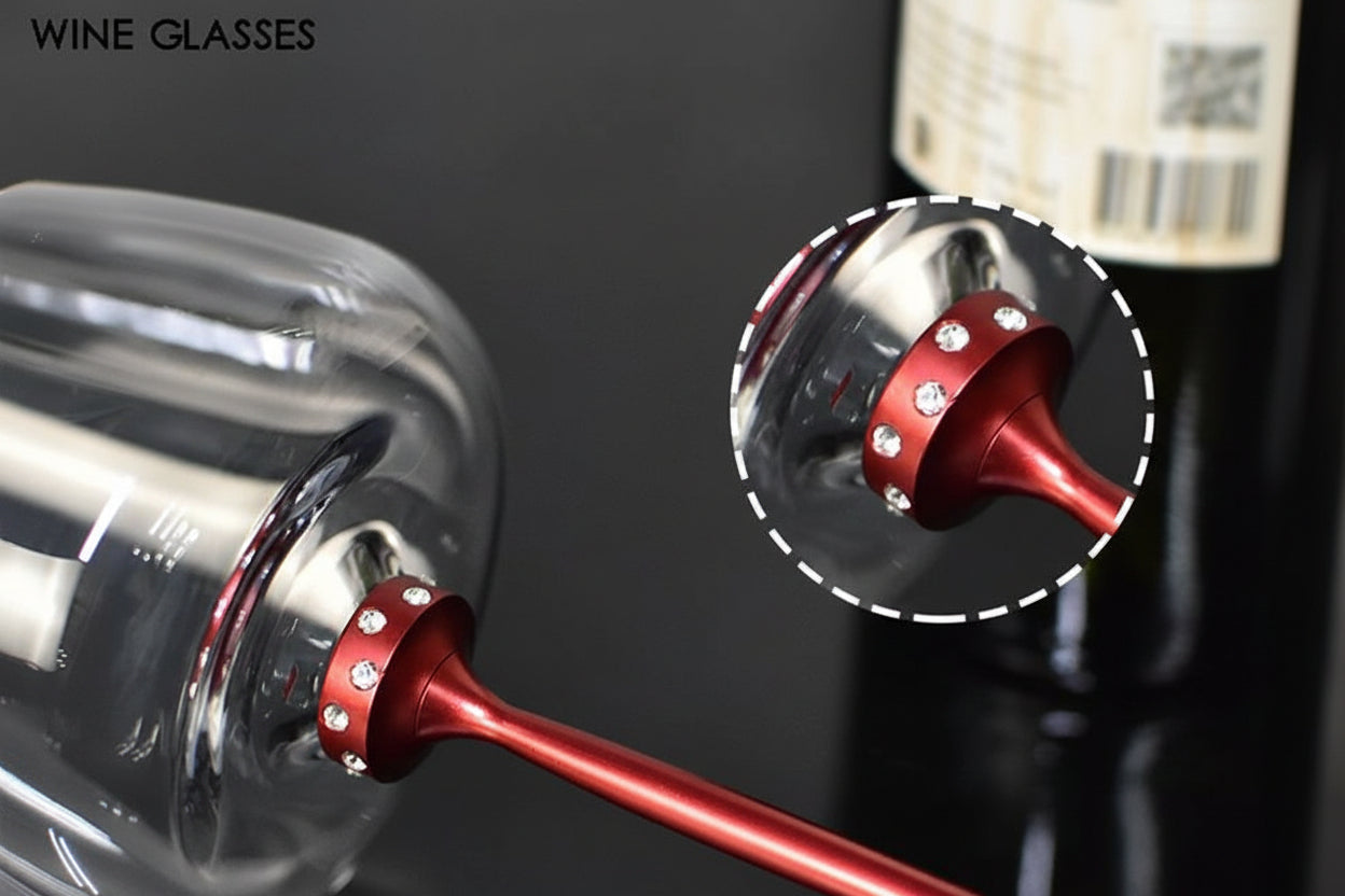 Baccarat crystal glassware gift set features a pair of elegant red-stemmed glasses nestled
